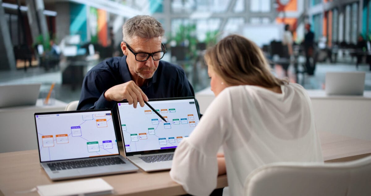 Two Business Professionals Collaborate